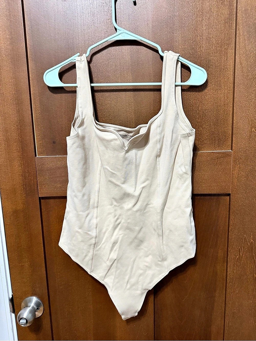 Abercrombie & Fitch Soft AF Collection One-Piece Bodysuit in Cream